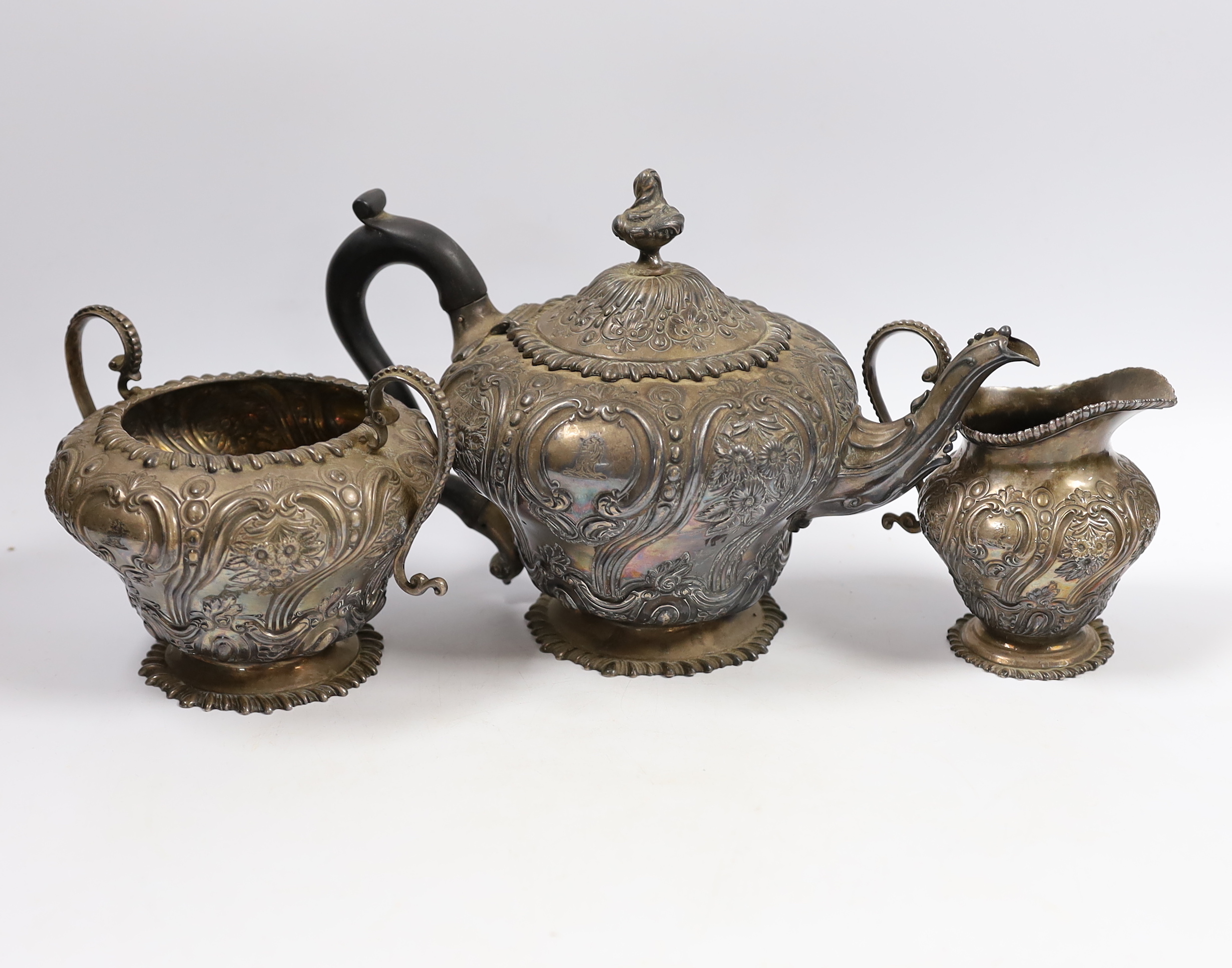 A late Victorian embossed silver inverted pear shaped three piece tea set, W & C Sissons, London, 1891, gross weight 41oz.